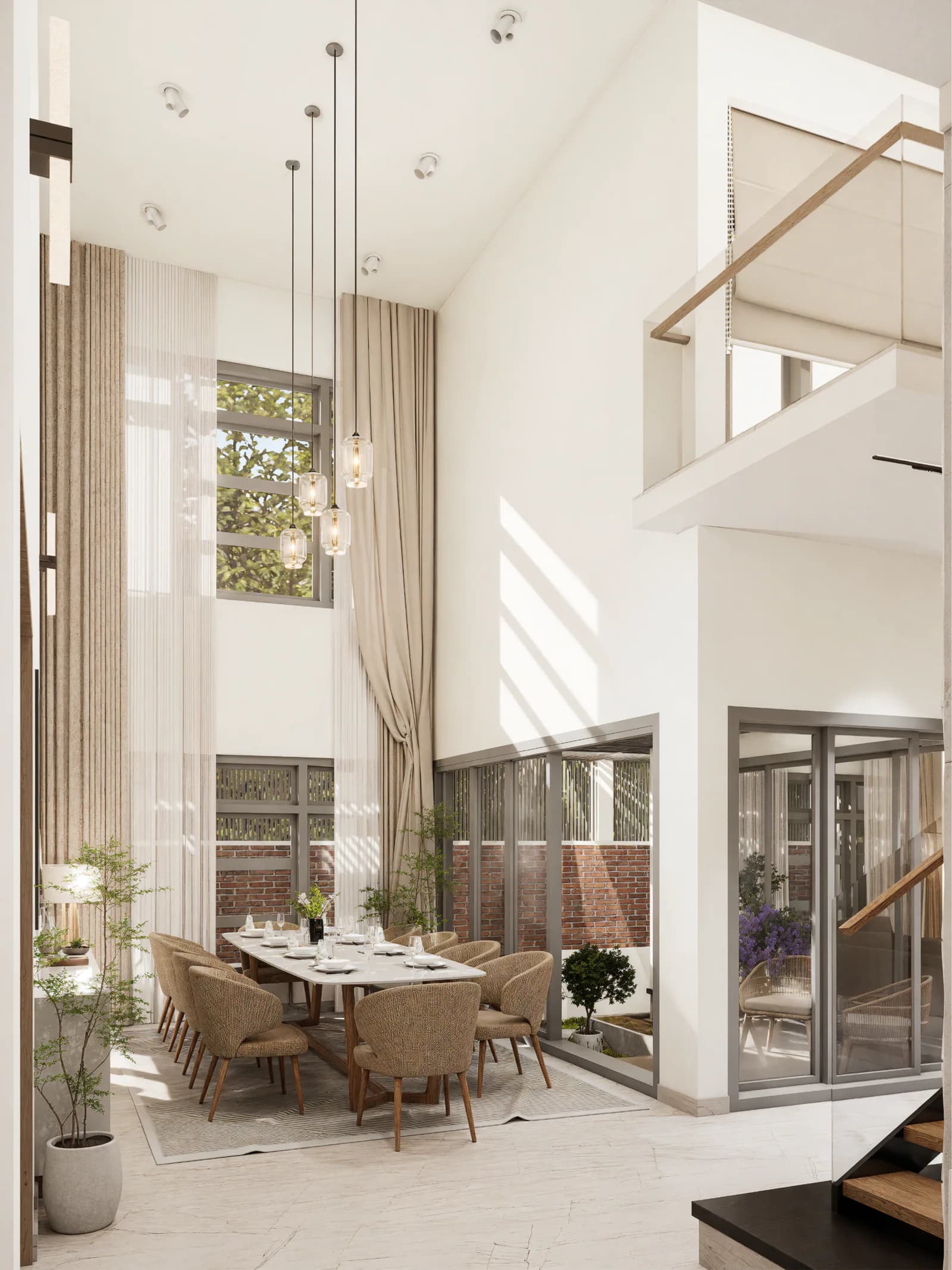 Double-height dining interior with marble table and tall draped windows
