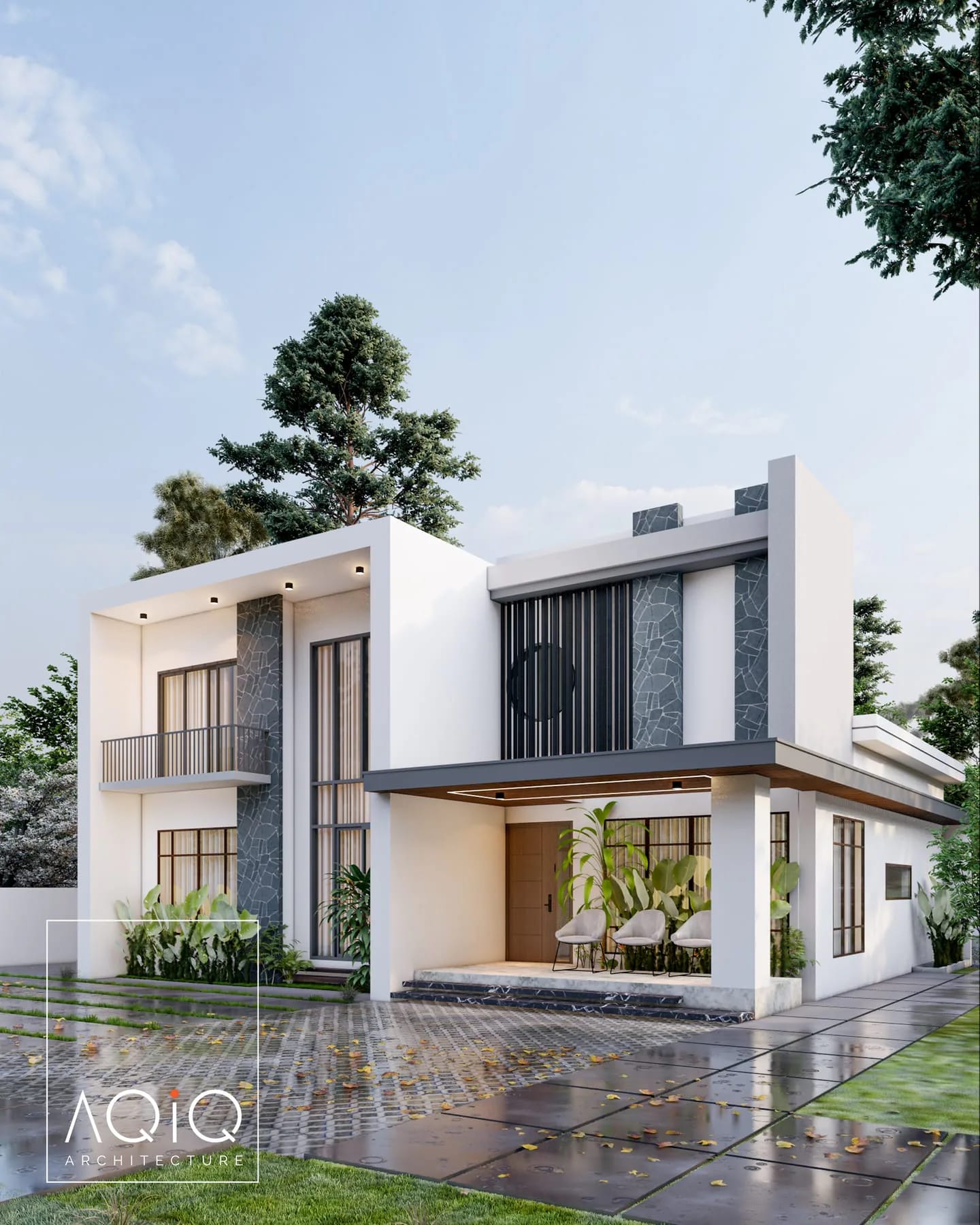 White two-storey house with grey stone piers and a timber front door