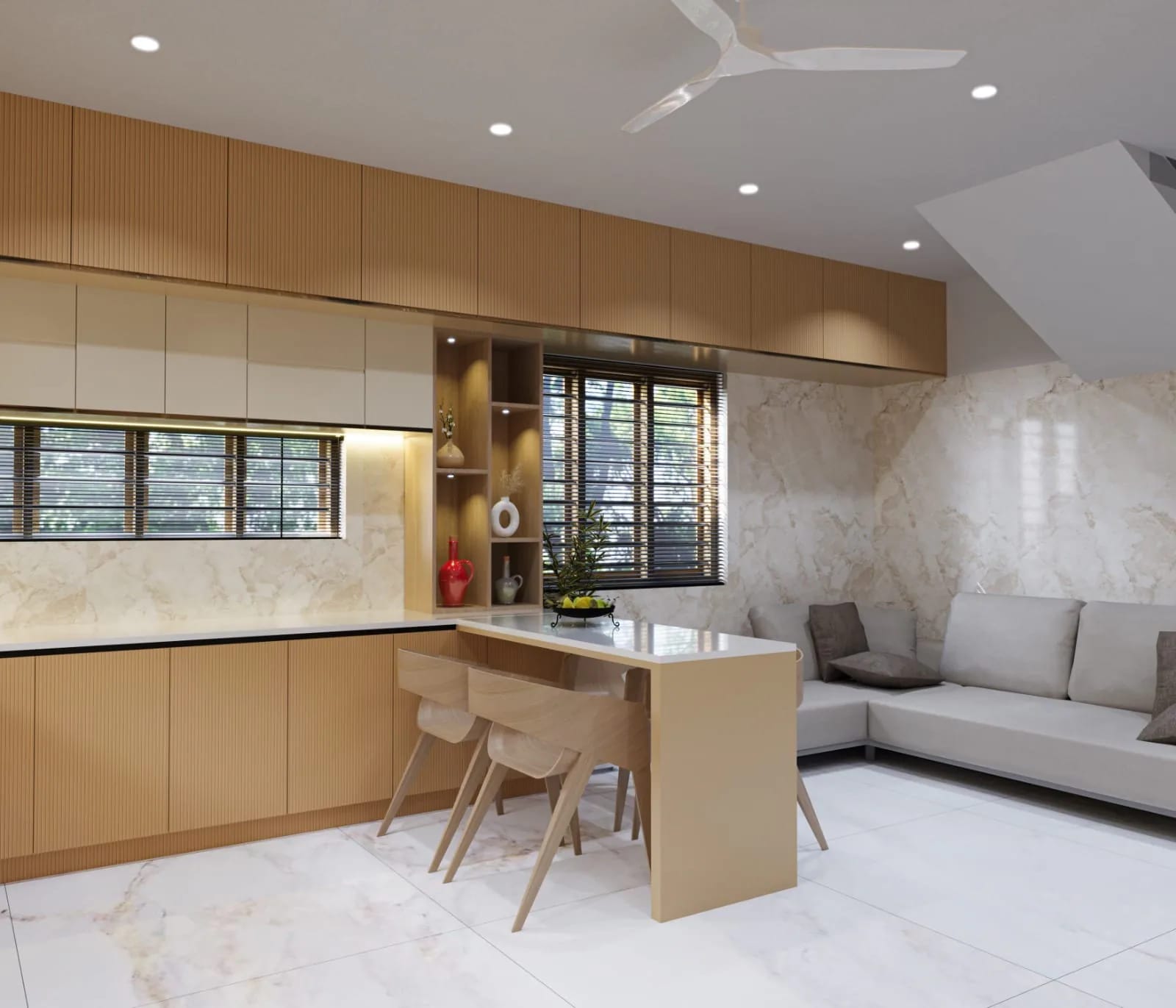 Open-plan kitchen and living room with reeded timber cabinets and a grey sofa